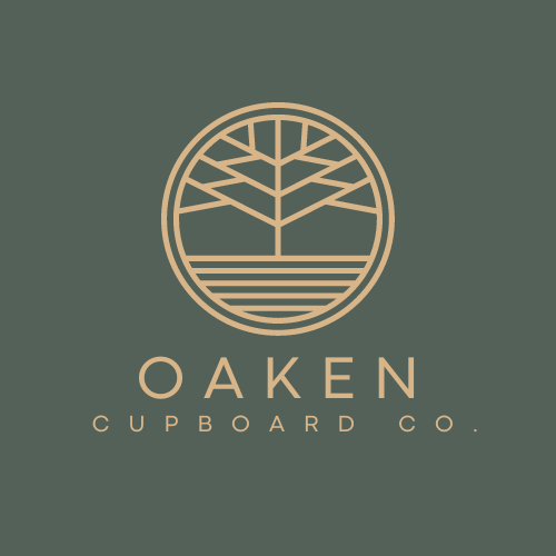 Oaken Cupboard Co. logo featuring handcrafted tree design representing quality woodwork and craftsmanship